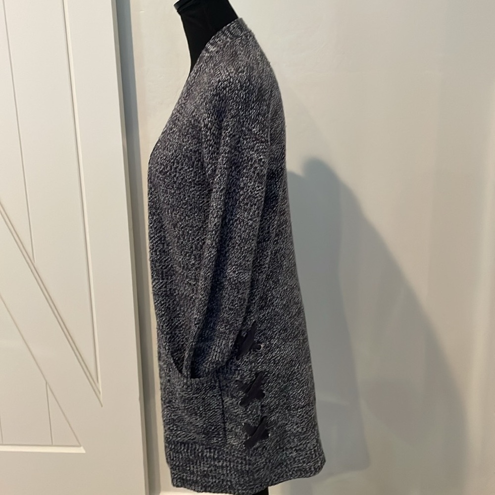 Cardigan with pockets and lace up sides